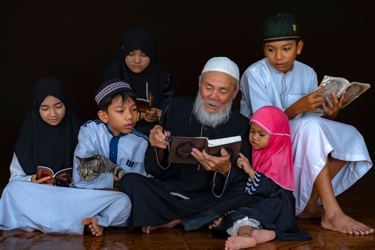 Children engaged in study inside a mosque